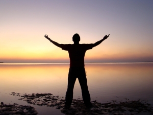 man, silhouette, beach, sunset, dusk, twilight, afterglow, male silhouette, open arms, backlighting, freedom, horizon, ocean, person, sea, seashore, nature, sunrise, water